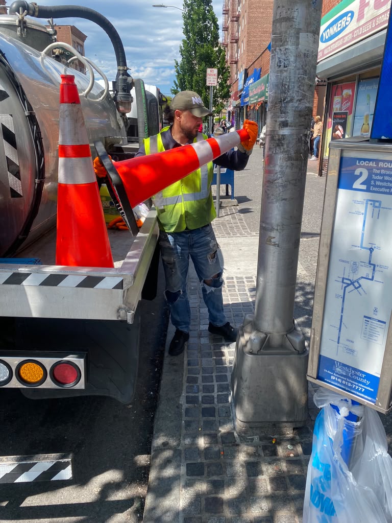 Solutions service truck performing restaurant waste service